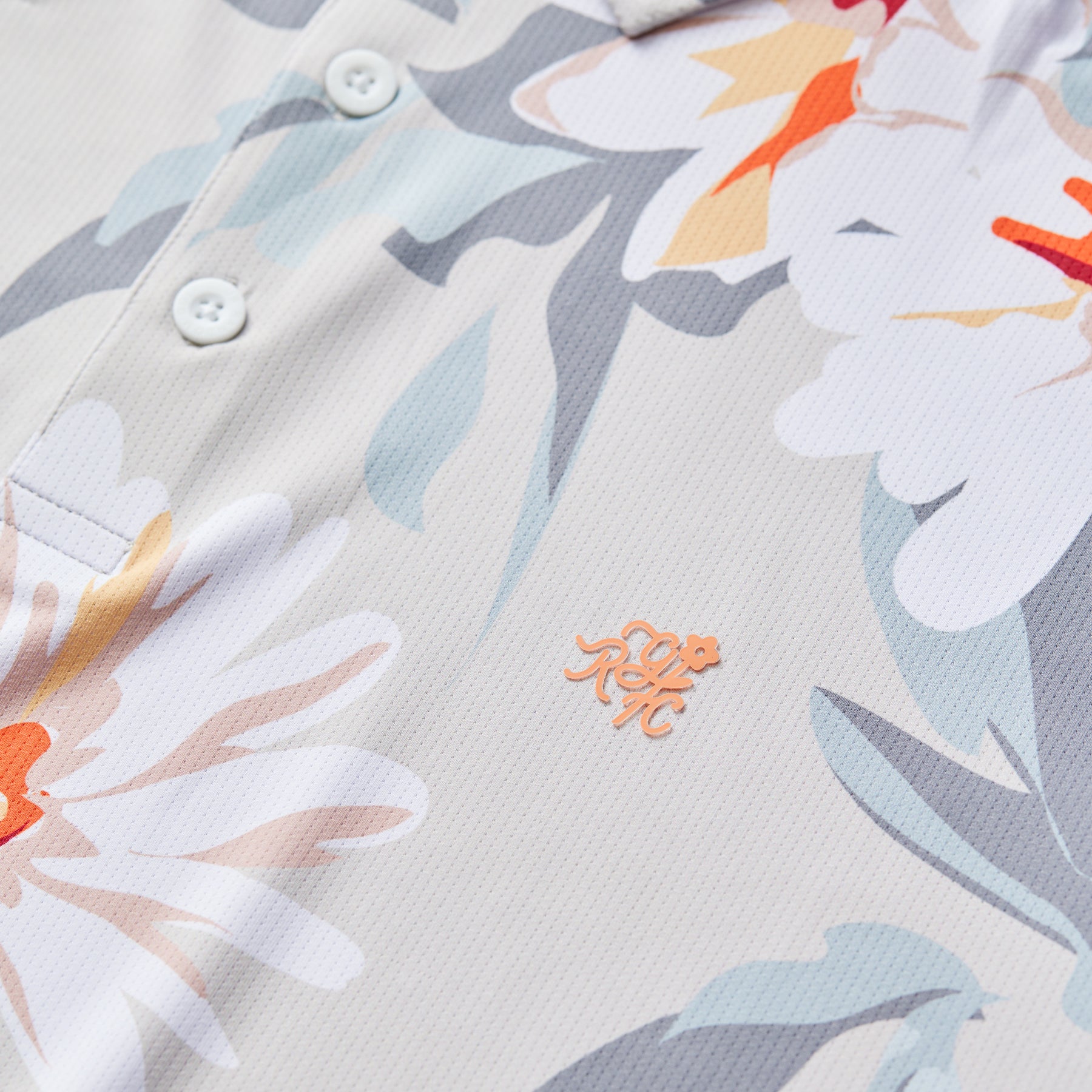 Bedrucktes Tech-Polo (natürliches Blumenmuster)