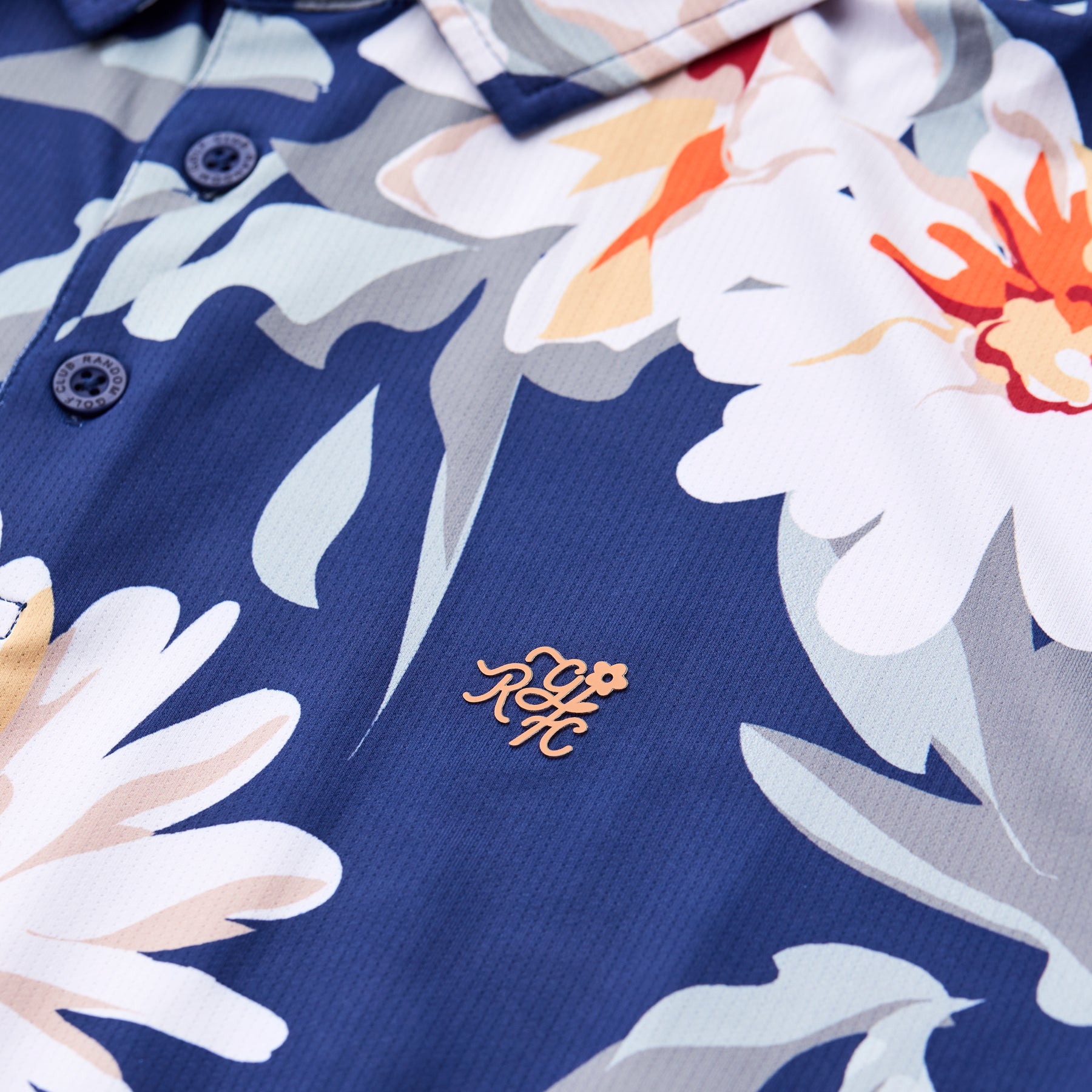 Bedrucktes Tech-Polo (Marineblau mit Blumenmuster)